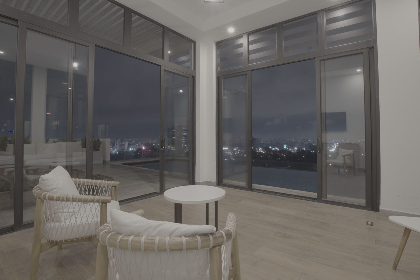 Flat unedited image: Lounge with floor-to-ceiling windows