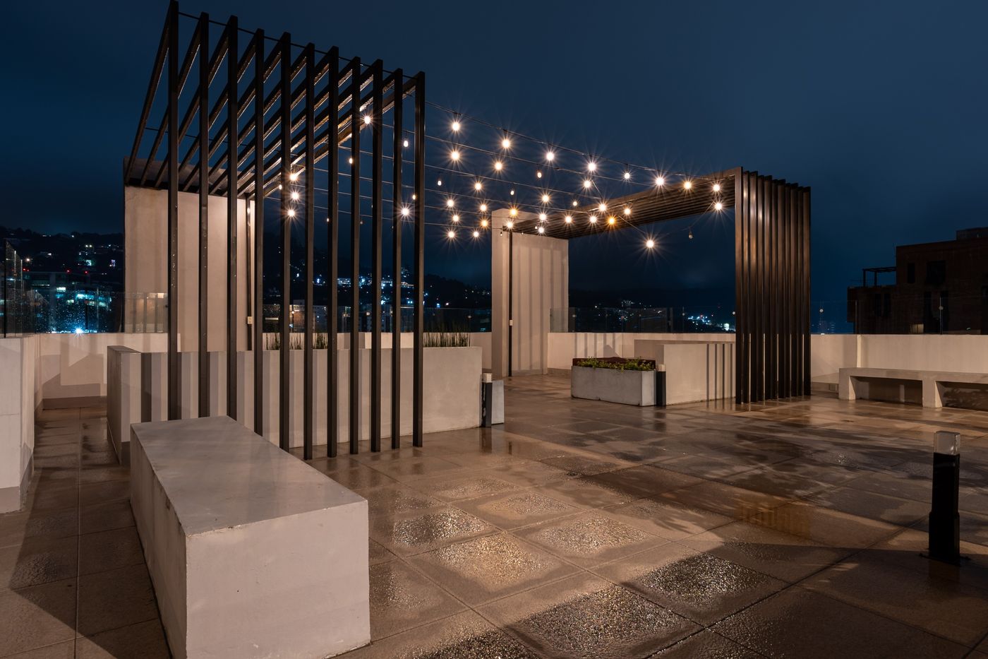 Final photo: Terrace with a pergola and string lights