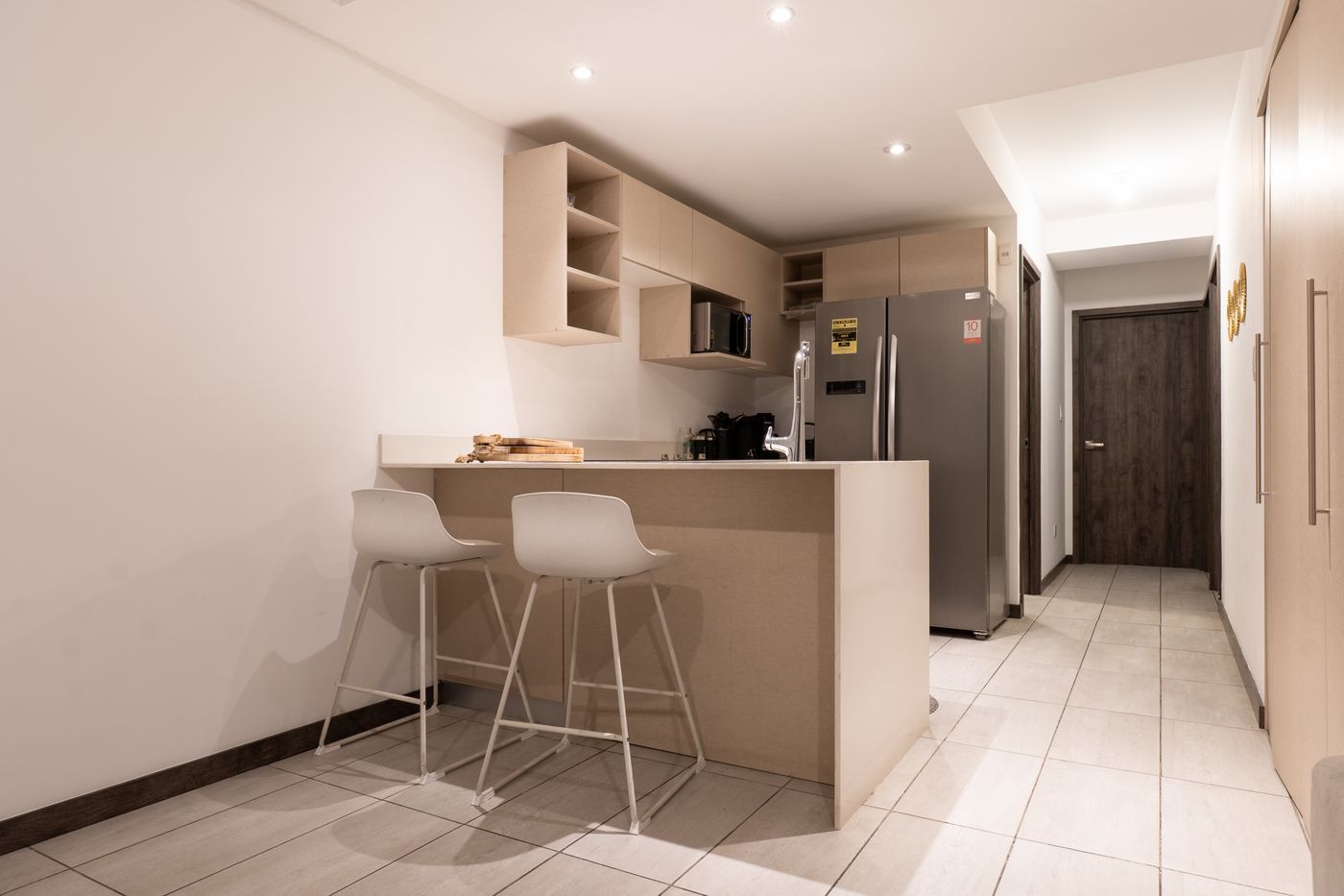 Final photo: Kitchen bar with tall stools