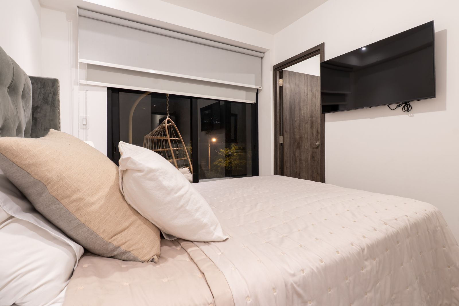 Close view of the bed and bedroom window